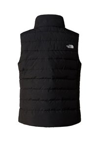 Svart puffervest med høy krage, kviltet design og sidelommer. Har den hvite North Face-logoen øverst til venstre.