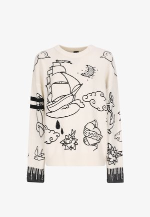 Weißer Pullover mit schwarzen bestickten maritimen und floralen Designs, runder Ausschnitt und schwarz-weiß gestreiften Ärmelbündchen mit Perlenakzenten.