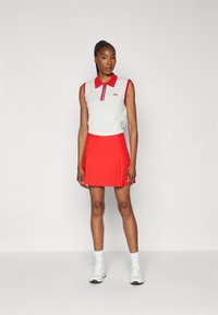 J.LINDEBERG Sports ELLE PLEATED SKIRT - Αθλητική φούστα - flame scarlet