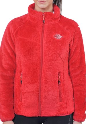 Veste en polaire rouge avec col montant, fermeture éclair sur toute la longueur à l'avant et deux poches latérales zippées. Texture douce avec un logo brodé sur la poitrine.