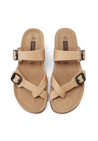Sandali in suede beige con cinturini incrociati e fibbie regolabili. Suola piatta, soletta testurizzata, taglia 37.