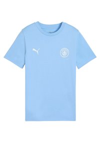 Svetlo modra mladinska majica iz 100% bombaža, ki ima na levem prsnem delu belo Puma logotip in okroglo emblemo Manchester City.