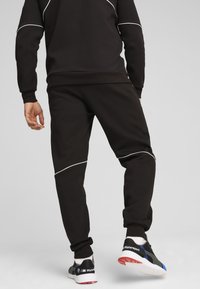 Puma - Spodnie treningowe