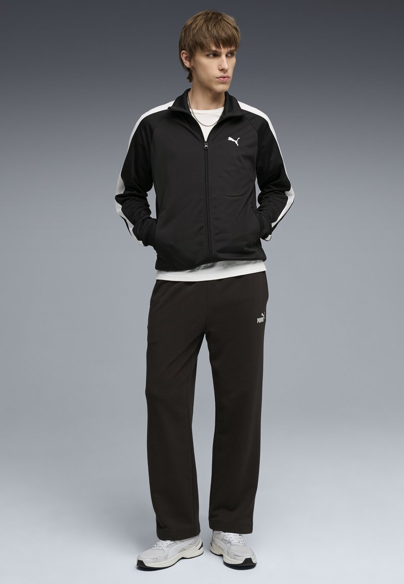 Puma ESSENTIALS NO. 1 LOGO RELAXED - Teplákové kalhoty - black