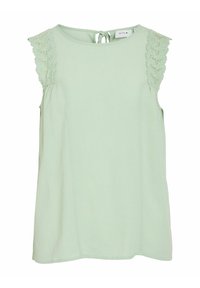 Miętowo-zielony bezrękawnik z koronkowymi wstawkami na ramionach, okrągłym dekoltem i wiązaniem z tyłu. Miękki, lekki materiał.