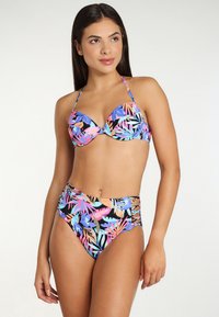 High-waisted bikini set with a black base and vibrant tropical leaf print in pink, blue, and orange; has structured cups and strappy sides.