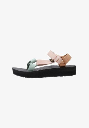 Sandal con suola in gomma nera, cinghie verde menta e rosa, dotata di fibbie regolabili e una soletta texturizzata per una migliore aderenza.