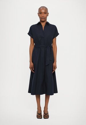 Navy button-down dress with short sleeves, waist tie, and a flared skirt. Smooth fabric with a clean silhouette, no visible patterns.