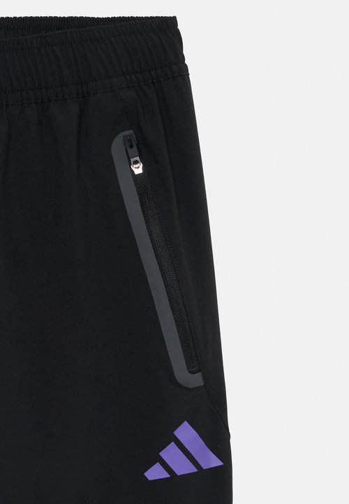 adidas MANCHESTER UNITED COMPETITION TECH TRAVEL PANT UNISEX - Club wear - black/purple rush — photo 3
