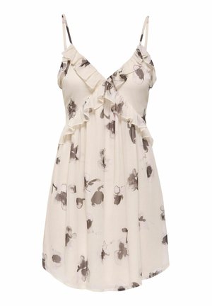 Robe sans manches crème avec imprimés floraux noirs et gris, encolure en V à volants et fines bretelles.