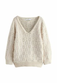 Pull en tricot beige avec un col en V, présentant un motif de grille texturé et des poignets et un ourlet côtelés. Fabriqué à partir d'un fil épais et doux.