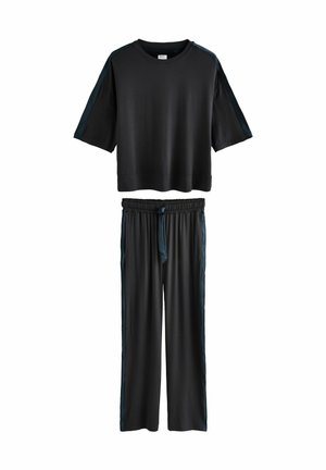 Black two-piece loungewear set with short-sleeve top and drawstring waist pants, both featuring dark side stripes.