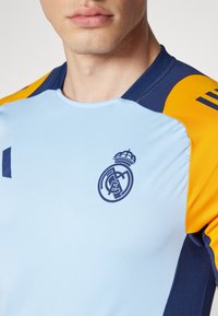 adidas Performance REAL MADRID 24/25  JERSEY - Klubska moštva - glow blue/crew orange/team navy blue