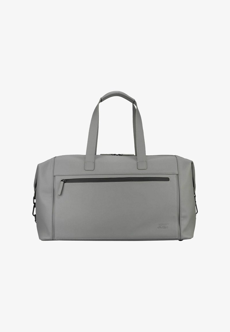 Sac de sport rectangulaire gris avec deux poignées, une poche avant zippée et un logo discret en relief dans le coin inférieur droit.