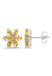 Boucles d'oreilles en forme de fleur avec pierres précieuses jaunes, montées en griffes, ornées de pierres taillées en ovale et d'un support en métal ton argenté.