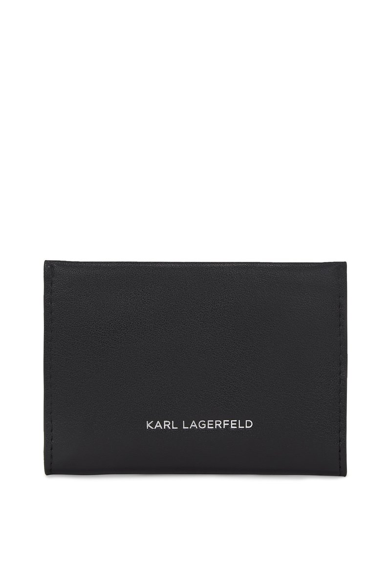 Porte-cartes en cuir noir avec une surface texturée et un logo "KARL LAGERFELD" en relief argenté. Design rectangulaire slim, style minimaliste.