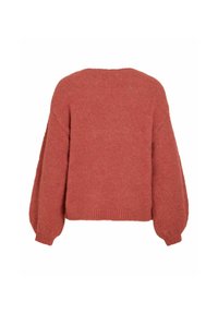 Pull tricoté couleur rouille avec de longues manches bouffantes et des poignets et un ourlet côtelés, vu de dos sur fond blanc.