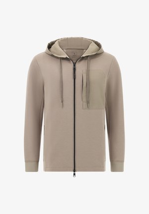 Bežna zip-up kapuca s kontrastno kapuco, sprednjim žepom in vrvicami. Ima gladko teksturo in prilegajoče manšete.