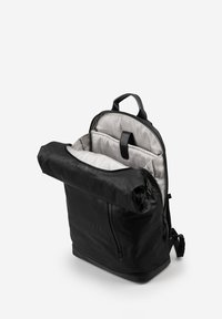 Black roll-top backpack with light gray checkered interior, open main compartment, padded laptop sleeve, front zipper pocket, and top handle.