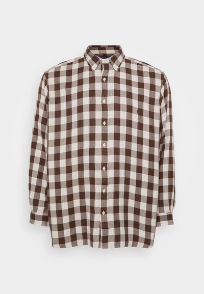 Καφετί και κρεμ καρό πουκάμισο με μακριά μανίκια. Κουμπωτός γιακάς, μπροστινά κουμπιά και ελαφρύ ύφασμα με χαλαρή εφαρμογή.