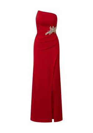 Rode strapless jurk met een aansluitende lijfje en een bevatten schede. Bevat verzameld stof en een versierd bladmotief ter hoogte van de taille. Gladde textuur.