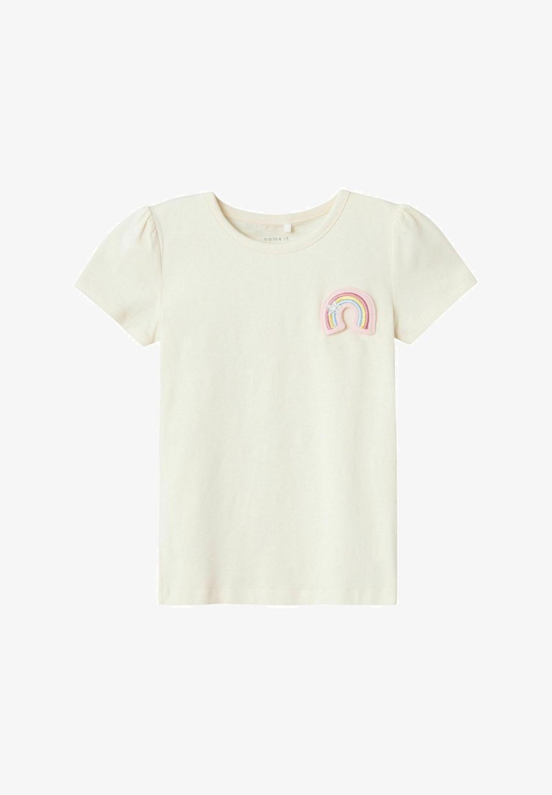 Lühikeste varrukatega kreemivärvi T-särk ümmarguse kaelusega ja volüümsete varrukatega. Ees on värviline tikitud vikerkaar.