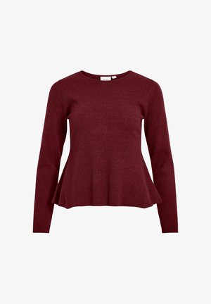 Bordo spalvos megztinis su ilgomis rankovėmis, apvaliu iškirpimu ir platėjančiu apačios kraštu. Visas mezgimas su siaurų briaunelių raštu.