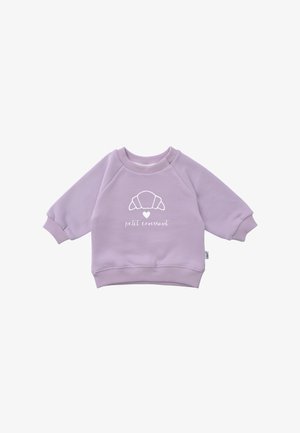 Lavender sweatshirt with raglan sleeves and ribbed cuffs. Features a white croissant graphic and "petit croissant" text. Soft fabric texture.