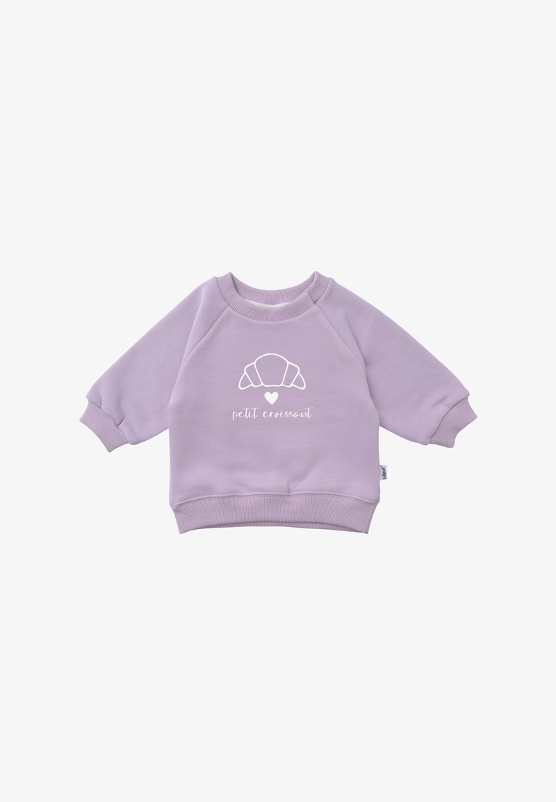 Lavender sweatshirt with raglan sleeves and ribbed cuffs. Features a white croissant graphic and "petit croissant" text. Soft fabric texture.