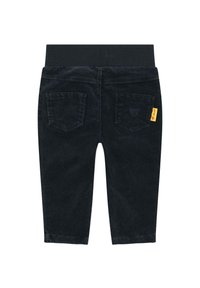 Černé kordové kalhoty s měkkým elastickým pasem, které mají dvě zadní kapsy a malou žlutou značkovou visačku na pravé kapse.