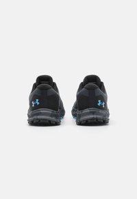 Black athletic shoes with a textured upper, blue accents, and a durable outsole. Designed with a cushioned collar and rear logo detail.