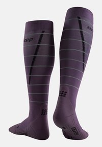 Knee-high compression socks in purple with gray stripes. Features textured heel and toe sections, and brand logo on the front.