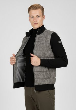 - Kurtka przejściowa