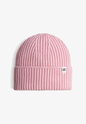 Pink knitted beanie with ribbed texture, cuffed design, and a small white logo label. Soft material, warm and stretchy fit.