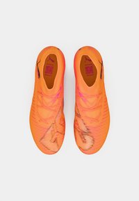 Puma FUTURE 8 MATCH MG pomarańczowy