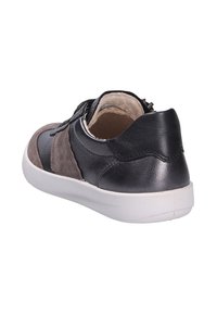 Black and gray sneaker with leather and suede materials, rounded shape, white rubber sole, and a zip closure on the side.