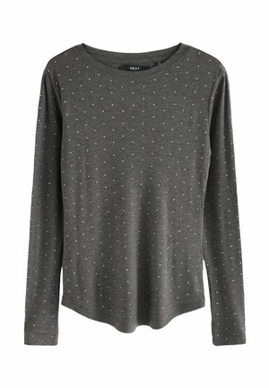 Grau langärmeliges T-Shirt mit Rundhalsausschnitt, das ein verstreutes Muster aus weißen Punkten auf dem Stoff sowie einen abgerundeten Saum aufweist.