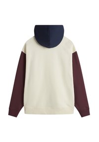 Hooded sweatshirt with a cream body, maroon sleeves, and navy hood. Features a relaxed fit and ribbed cuffs and hem.