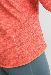 Nike Performance Sport T-shirt - orange