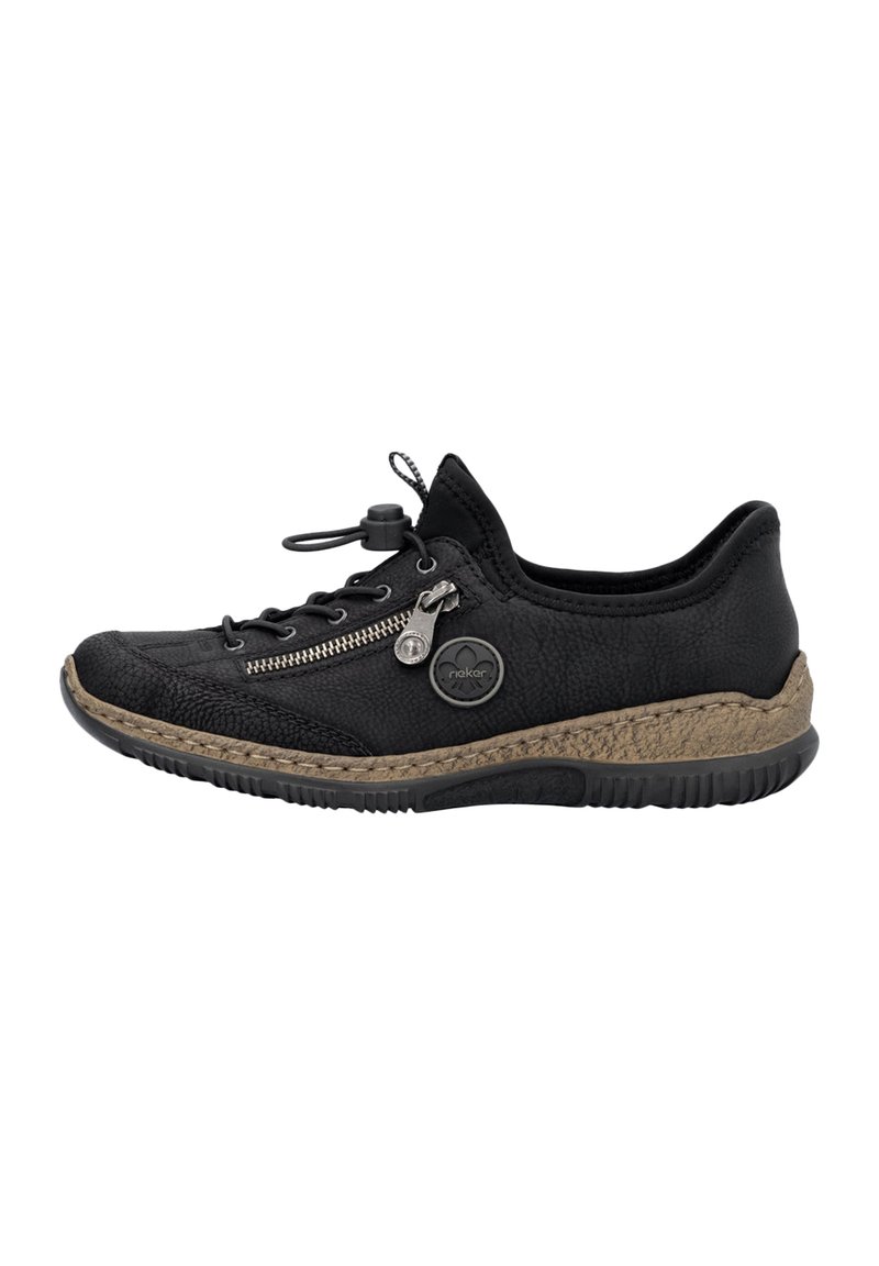 Chaussure en cuir noir avec une tige texturée, dotée d'une fermeture éclair sur le côté, d'un lace-up à l'avant et d'un biais tressé marron le long de la semelle.