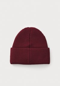 Burgundy knitted beanie hat with a ribbed texture and a turned-up cuff. Made of soft material, featuring a rounded top design.