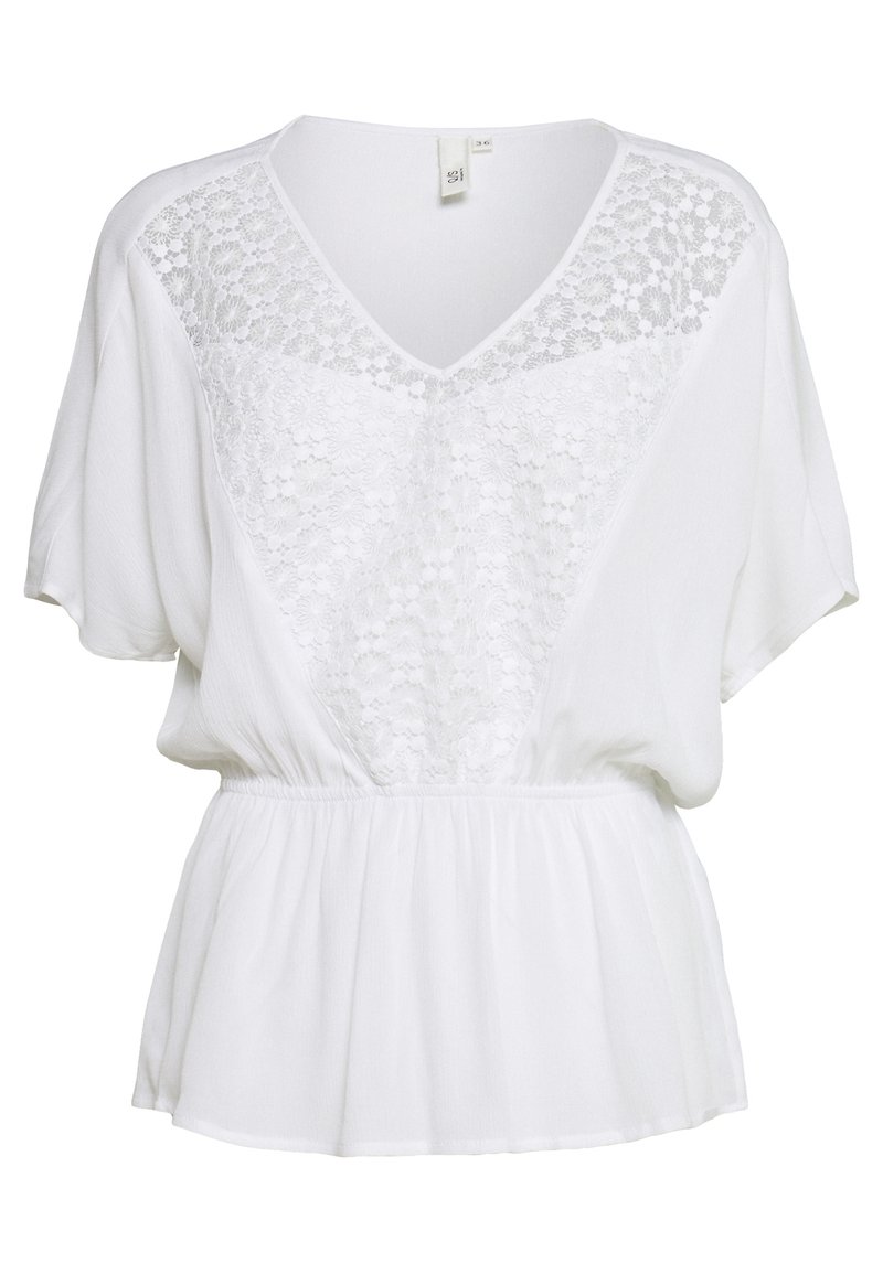 Blusa bianca con maniche corte, scollatura a V e dettagli in pizzo sul davanti. Tessuto morbido con vita arricciata per una vestibilità rilassata.