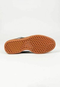 Suola di scarpa sportiva nera con un motivo a nido d'ape, dotata di un fondo in gomma marrone e impugnatura testurizzata. Design leggero e flessibile.