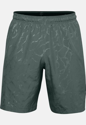 Shorts de sport vert foncé avec une texture légère et lisse, présentant des motifs de vagues subtils et une taille élastique pour le confort.
