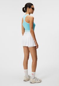 J.LINDEBERG Sports ISABEL SKIRT - Sportszoknya - white