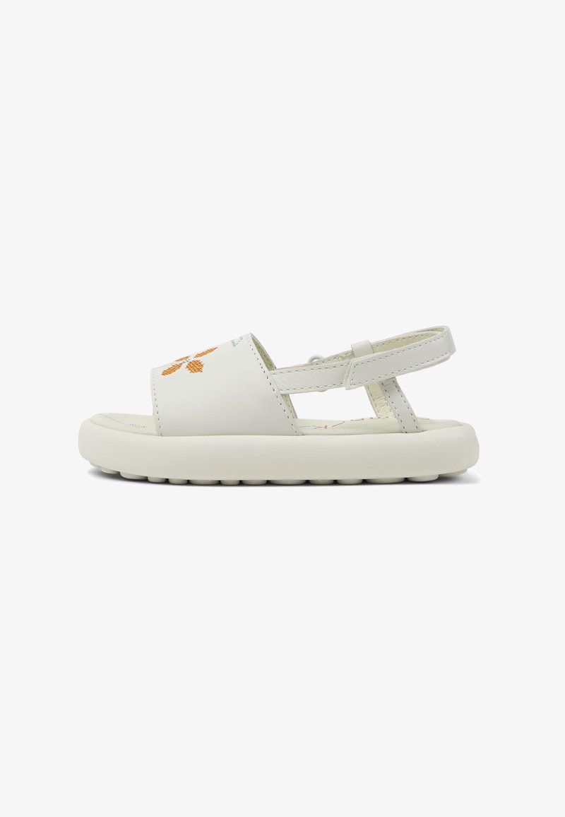 White sandals made of synthetic material, featuring a wide strap with orange stitching, an adjustable back strap, and a textured rubber outsole.