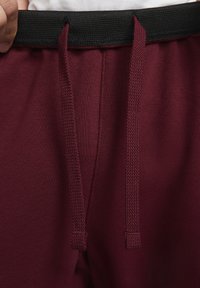 Nike Performance HERITAGE PANT - Calças de fato de treino - dark beetroot