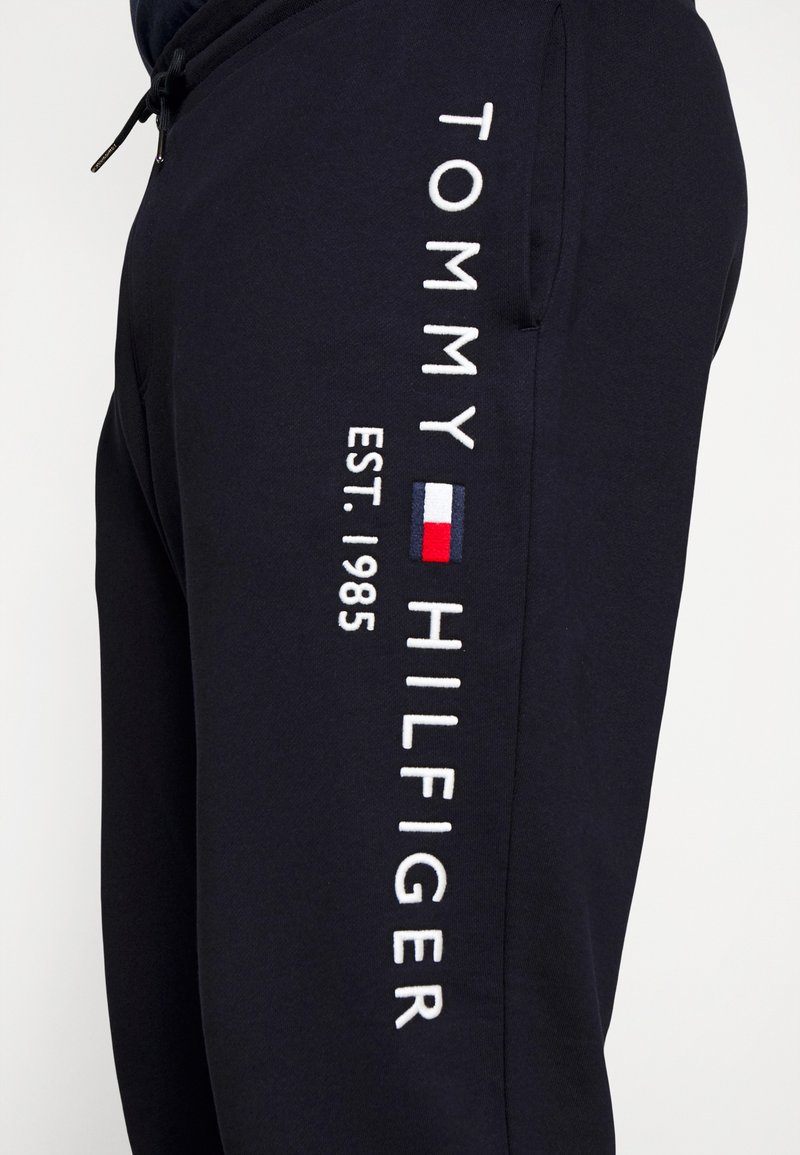 Tommy Hilfiger TOMMY LOGO SLIM - Tracksuit bottoms - desert sky/dark blue - Zalando.co.uk