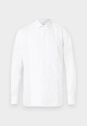 White long-sleeve shirt with a classic collar, featuring a pleated front panel and smooth sides, made of cotton fabric. Subtle glossy finish.