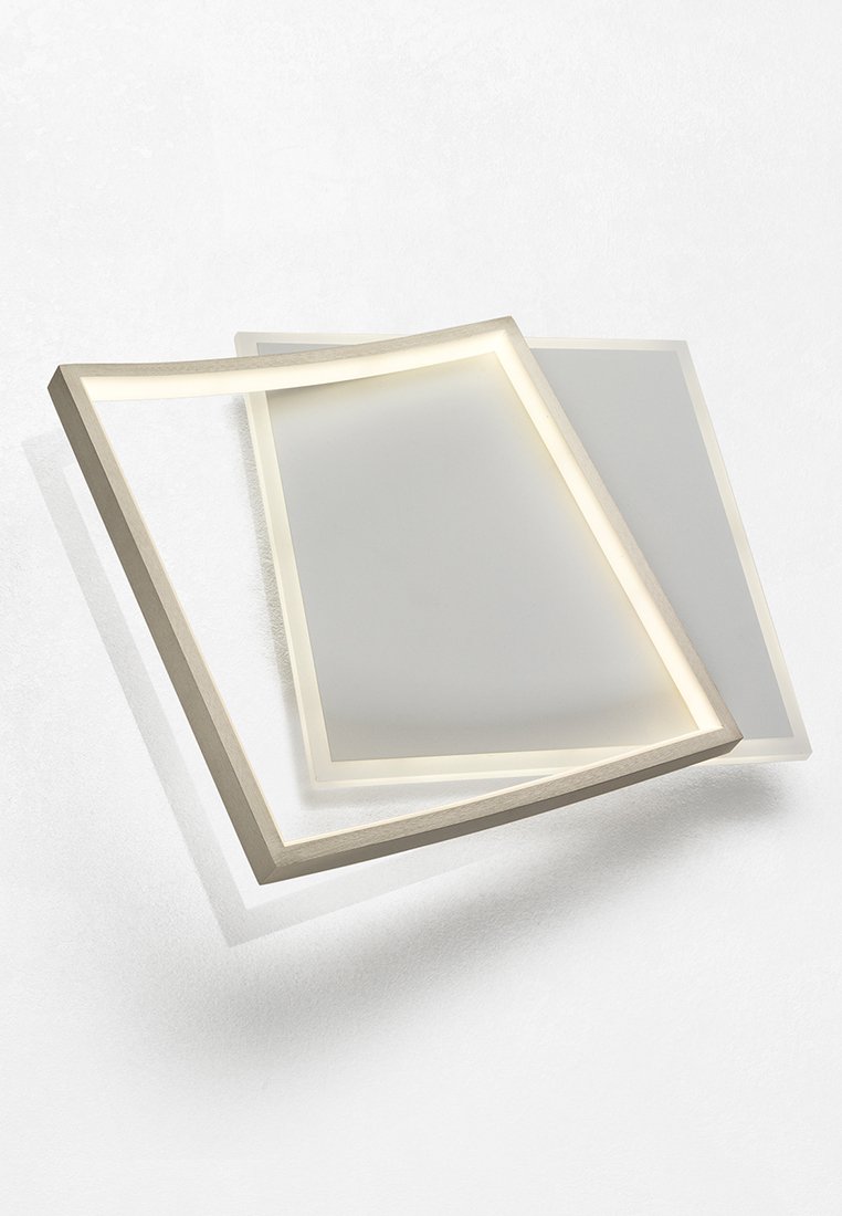 Wandlicht mit zwei überlappenden Rahmen. Ein Rahmen ist weiß, der andere hat eine metallische Kante mit integrierter LED-Beleuchtung.